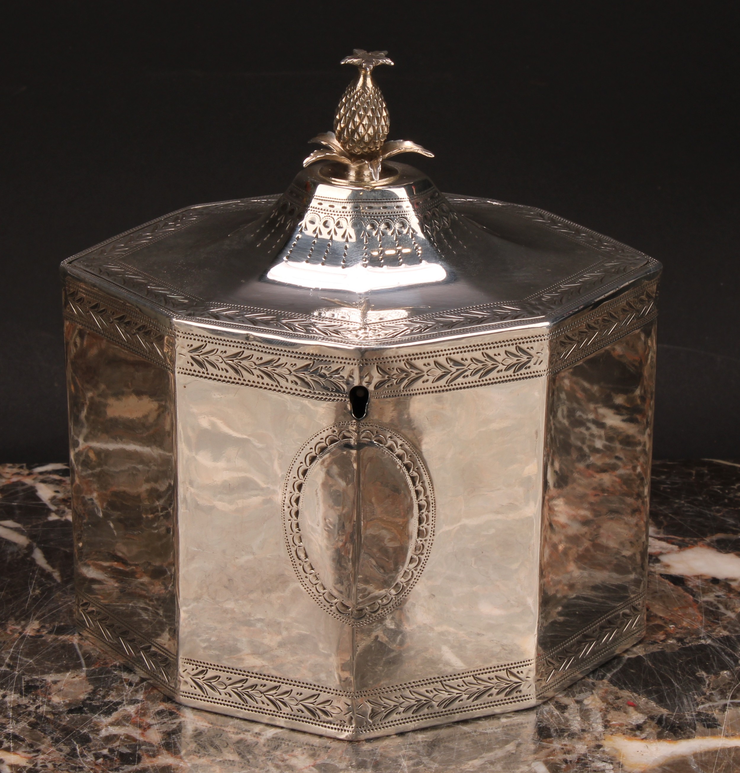 A George III silver octagonal tea caddy, flush-hinged cover with pine apple finial, bright-cut - Image 2 of 5