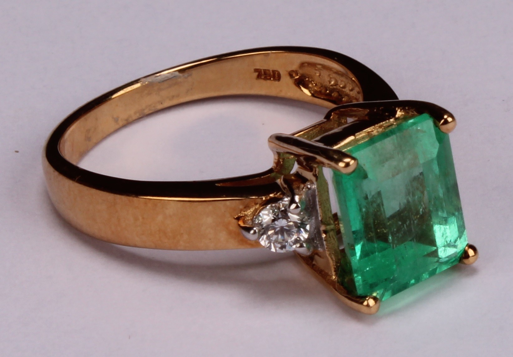 An 18ct gold, emerald and diamond ring, central cushion cut stone - Image 2 of 4