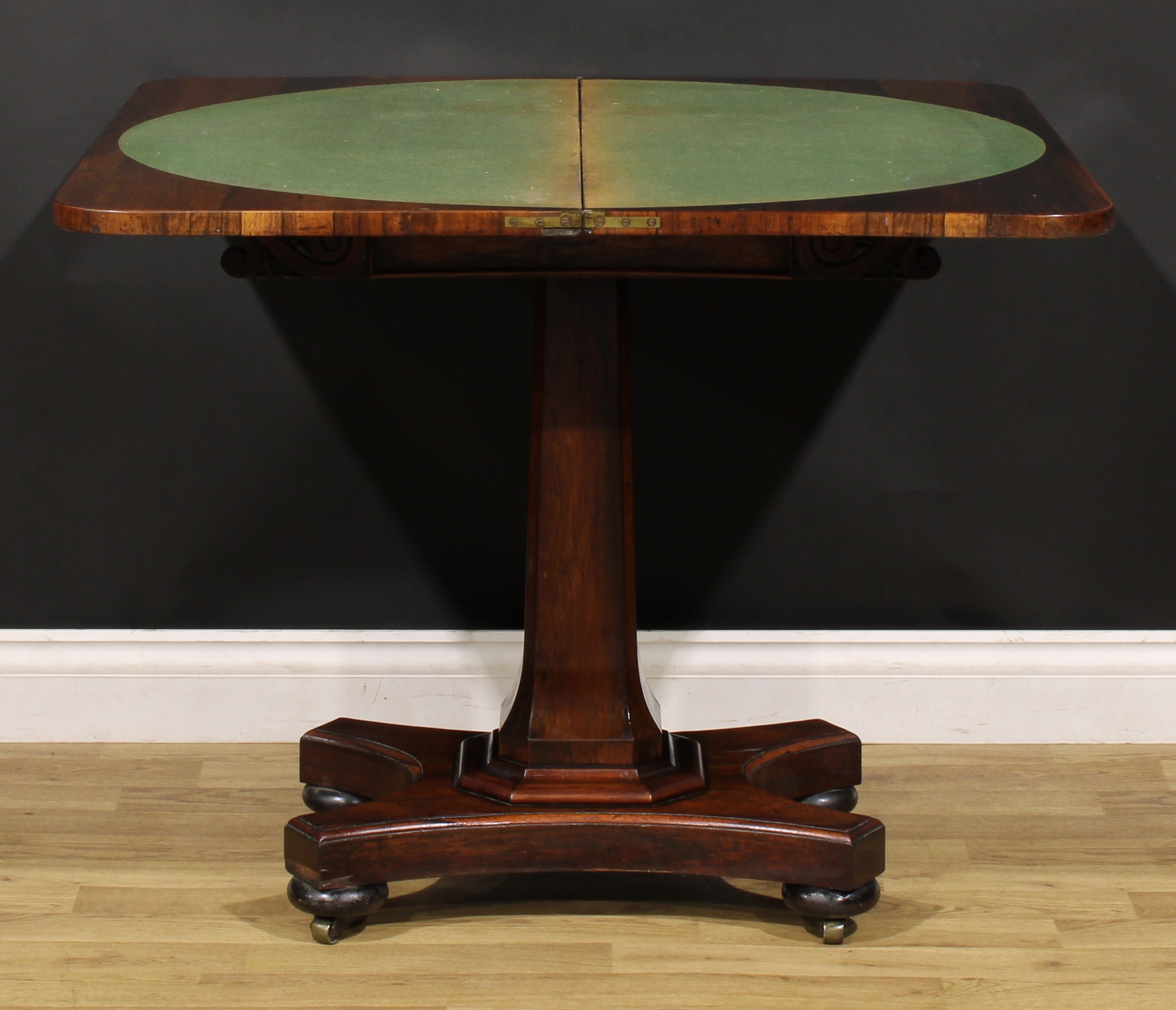 A William IV rosewood card table, rounded rectangular folding top above a frieze carved with leafy - Image 2 of 5