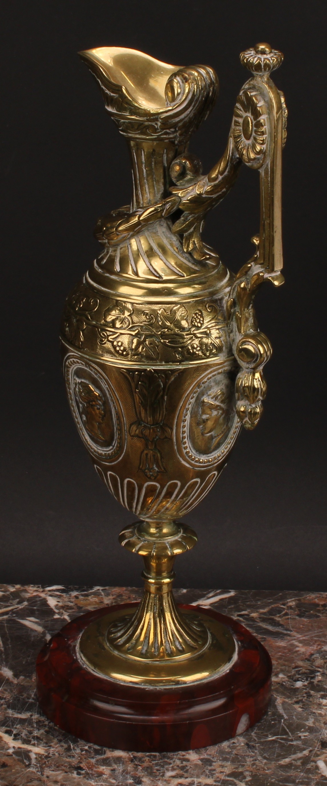 A 19th century Grand Tour bronze ewer, probably French, cast with portraits and fruiting vine, - Image 4 of 4