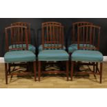 A set of six George III mahogany dining chairs, each arched back with four reeded splats,