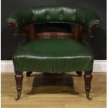 A Victorian rosewood and mahogany club library chair, stuffed-over upholstery, turned forelegs,