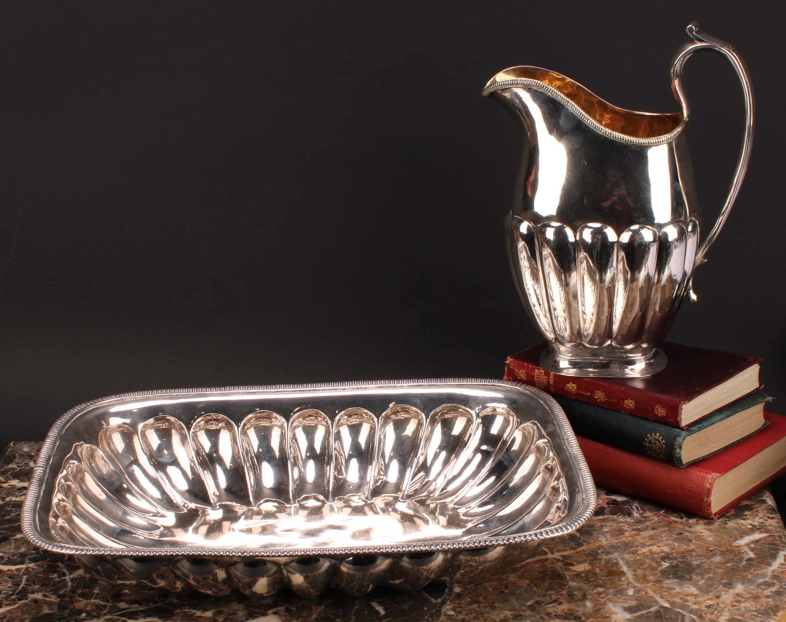 A 19th century Russian silver half-fluted rectangular ewer and basin, gadrooned borders, gilt