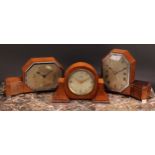 A mid-20th century walnut mantel timepiece, by Elliott, 13cm canted rectangular silvered clock