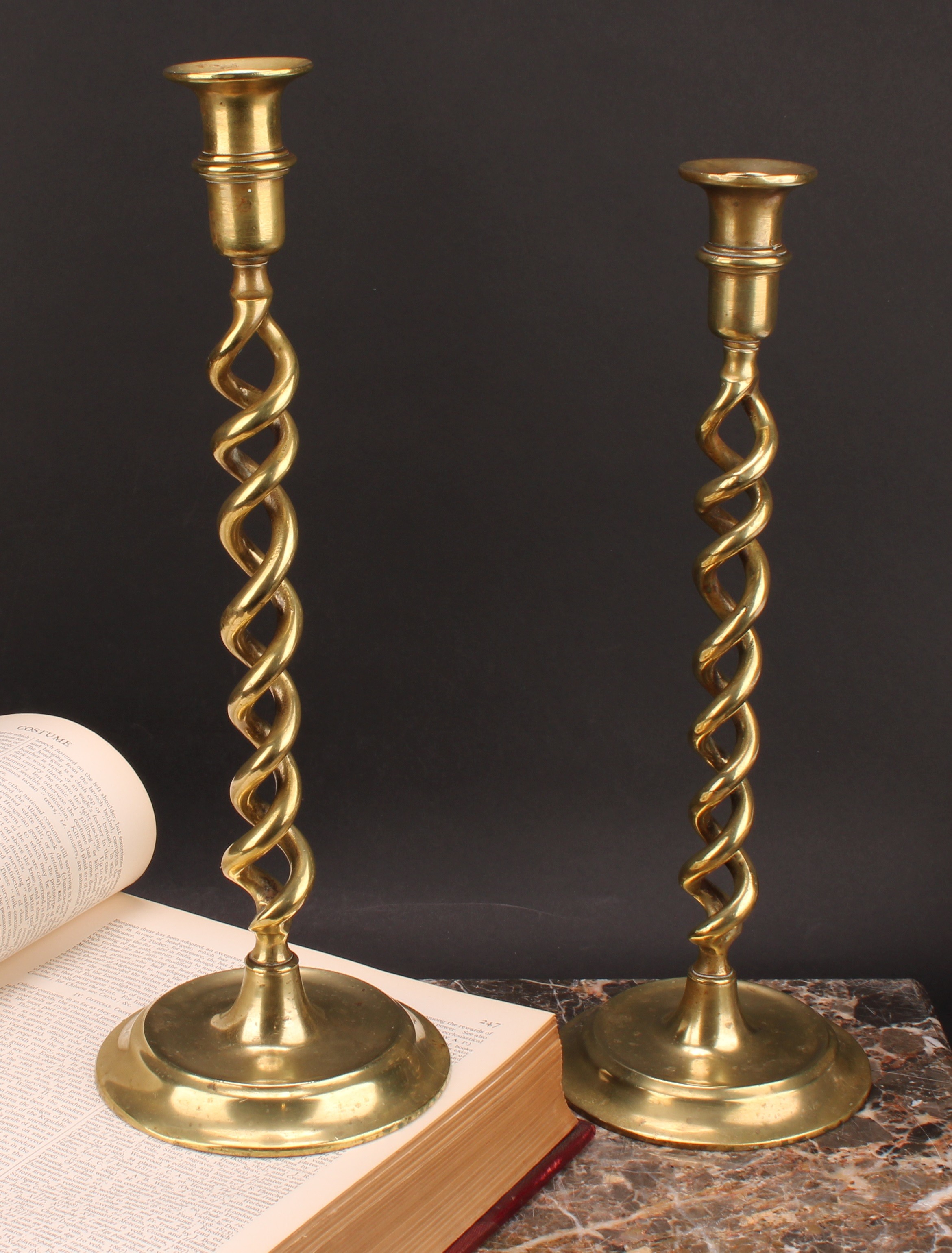 A pair of Victorian brass open-twist table candlesticks, dished circular bases, 37cm high, c.1880