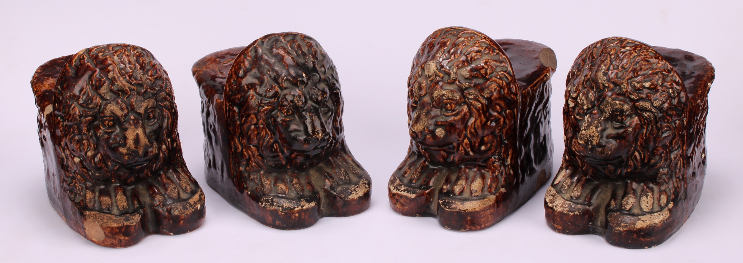 A set of four 19th century Staffordshire treacle glazed sash window stops or furniture rests, each - Image 2 of 4
