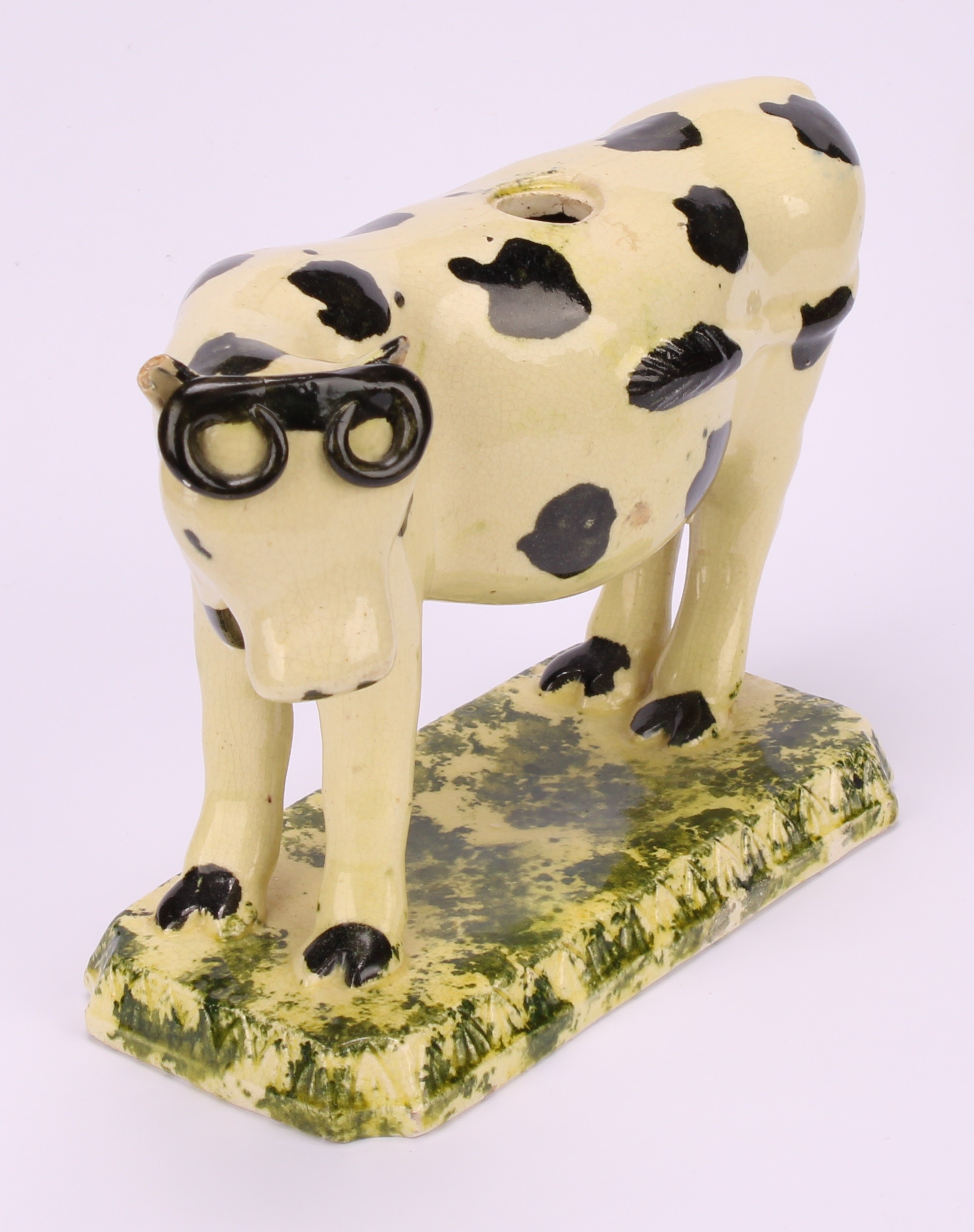 An early 19th Staffordshire spongeware cow creamer, as a dairy cow, 12cm; a 19th century - Image 4 of 11