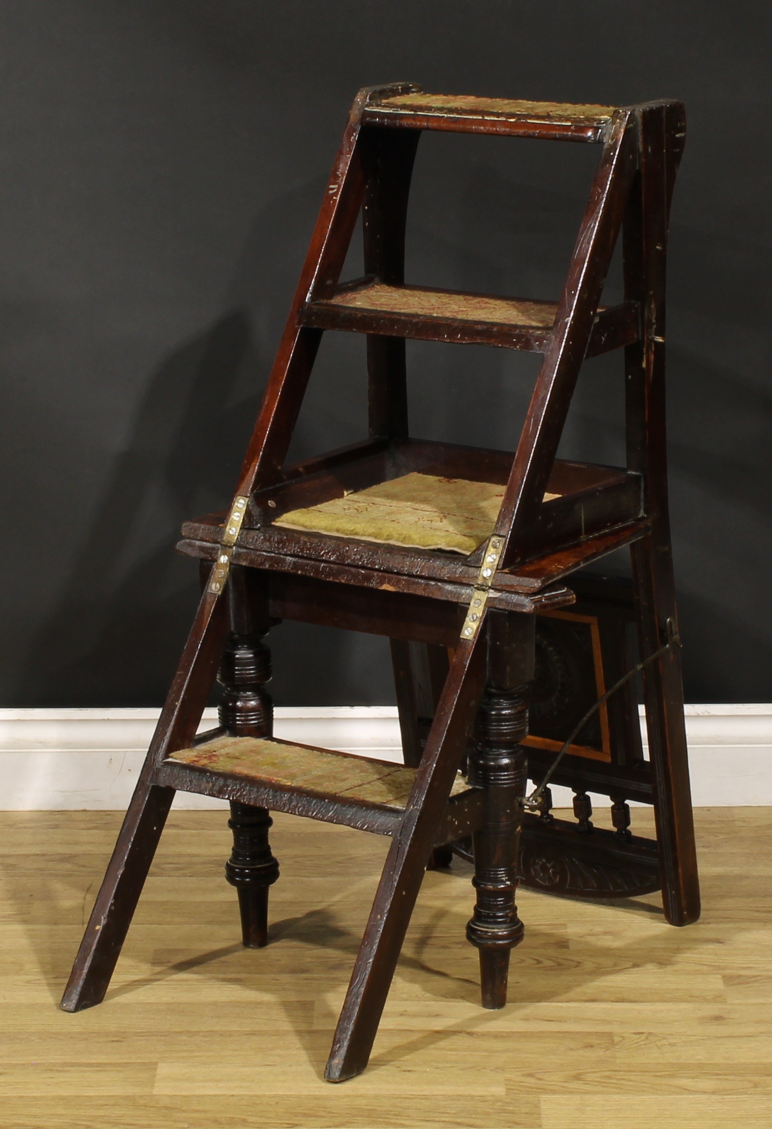 A late Victorian Aesthetic Movement metamorphic library step chair, spindle back with carved central - Image 5 of 6