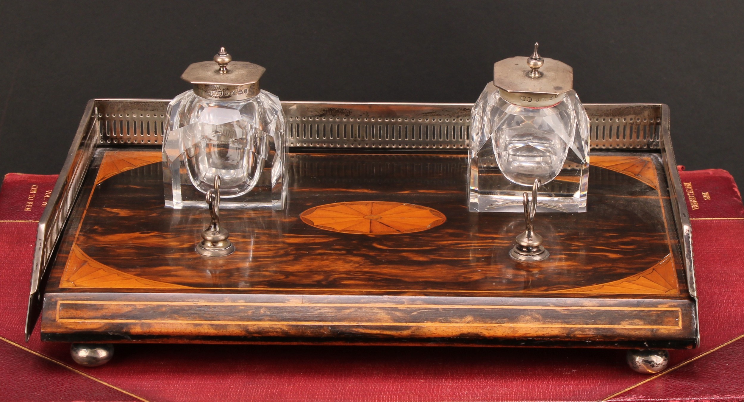 A Victorian silver mounted coromandel and marquetry inkstand, pierced three-quarter gallery, cut