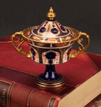 A Royal Crown Derby 1128 Imari pattern campana shaped two-handled vase and cover, castellated rim,