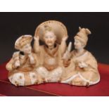 A Continental porcelain nodding head figure group, of two Geisha and Japanese man of title,