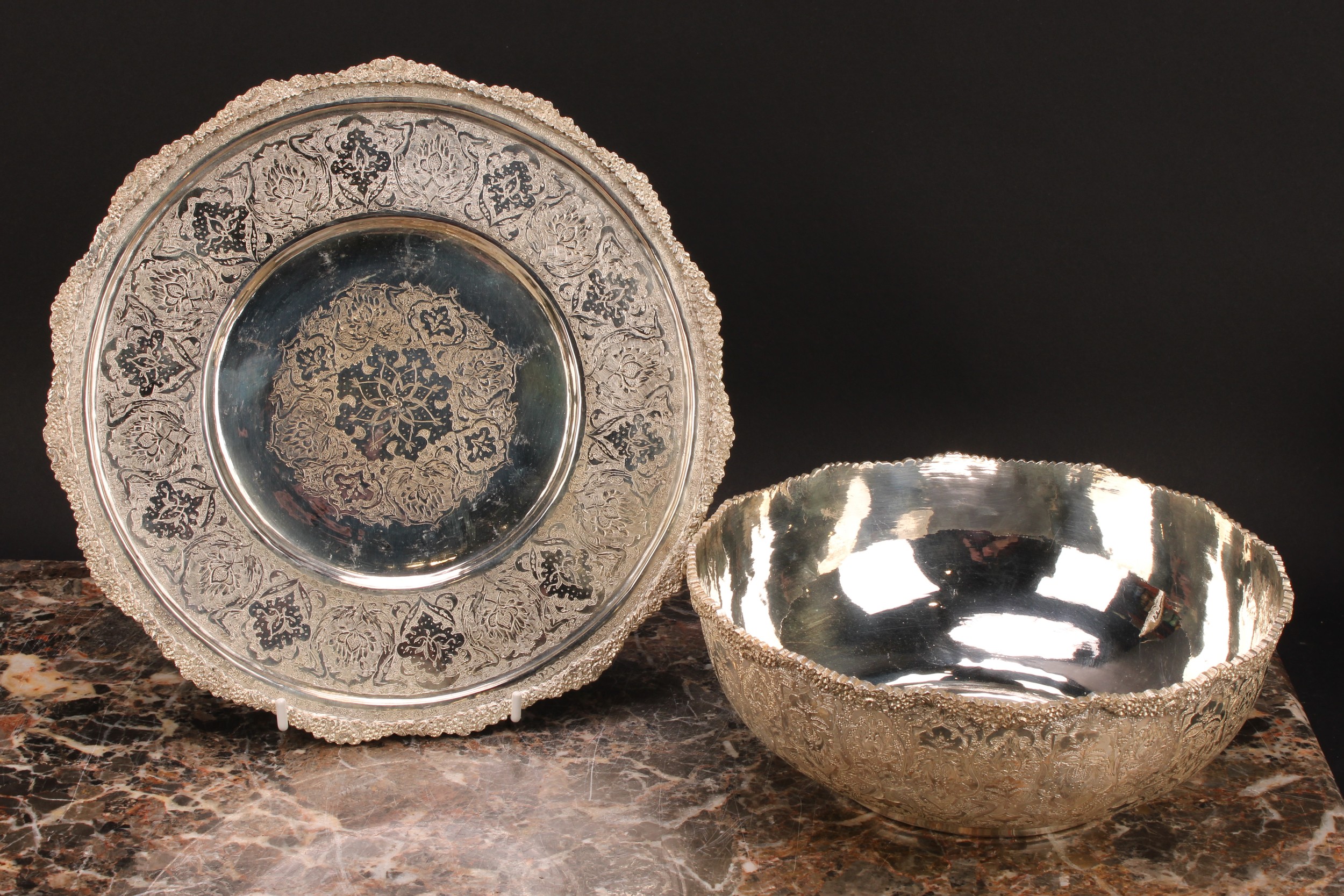 An Iranian white metal fruit bowl and stand, profusely chased in the Persian taste with lotus and - Image 3 of 6