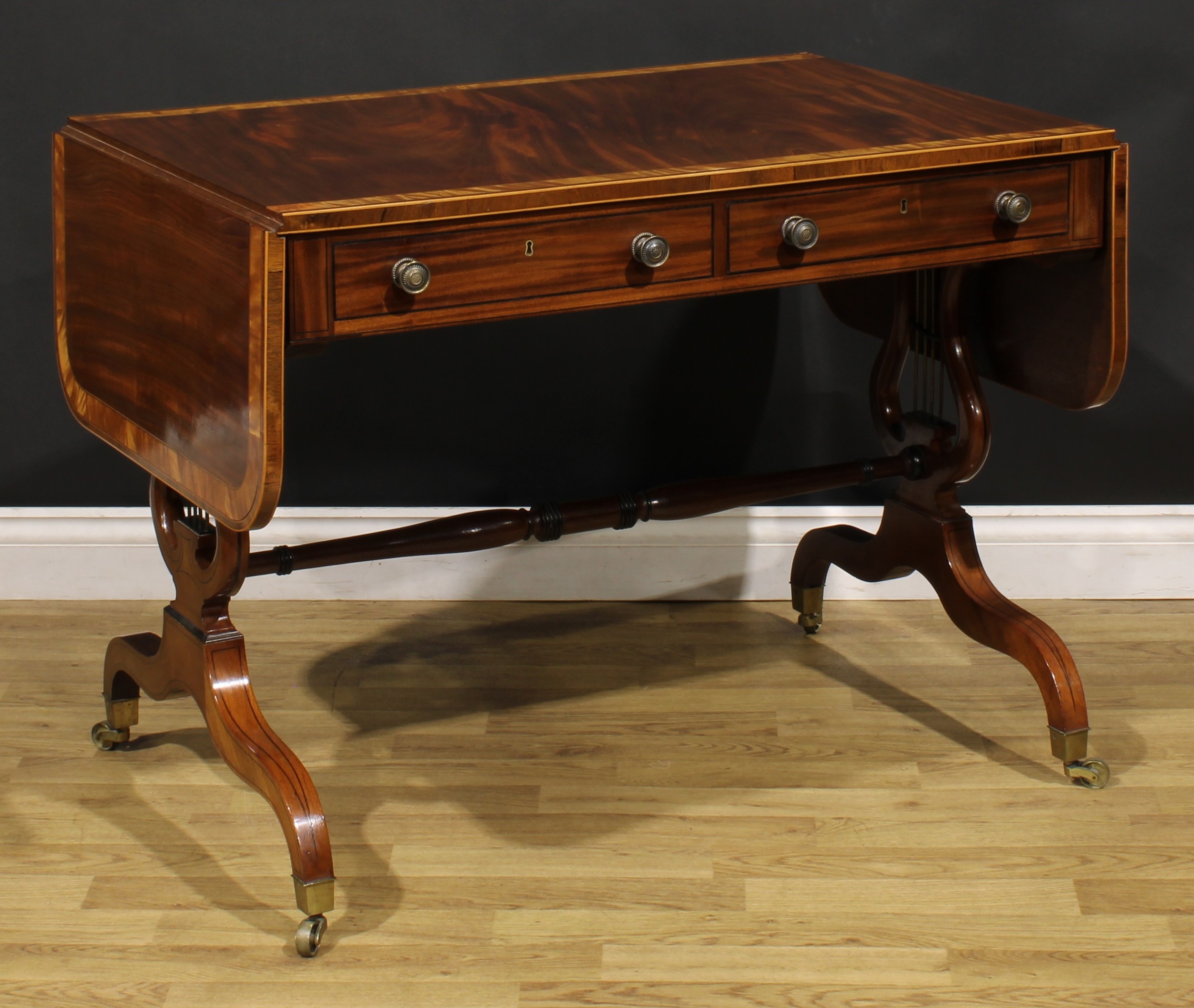 A Regency mahogany sofa table, rosewood crossbanded satinwood banded rounded rectangular top with - Image 4 of 6