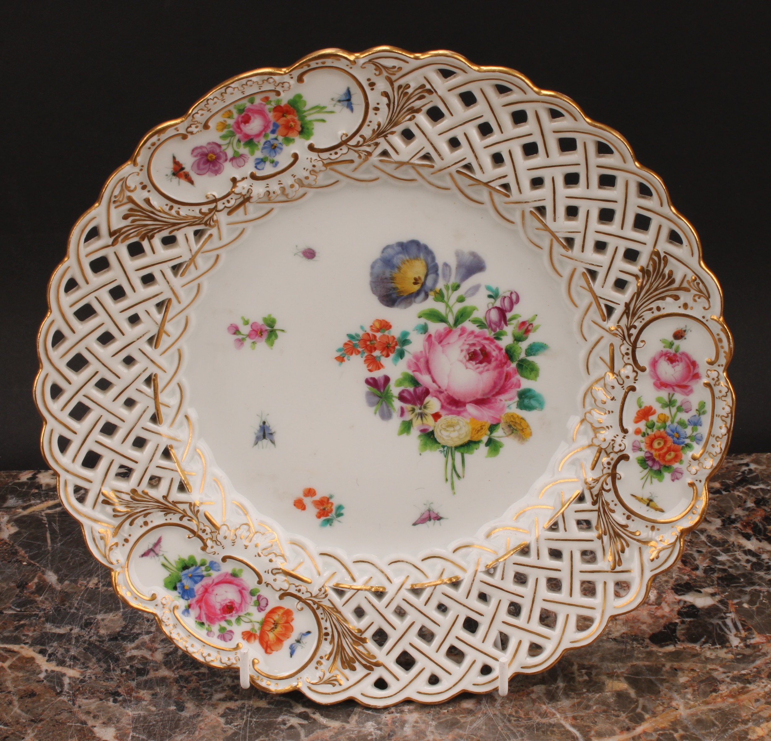 A set of six German porcelain shaped circular plates, decorated with flowers, pierced borders picked - Image 8 of 13
