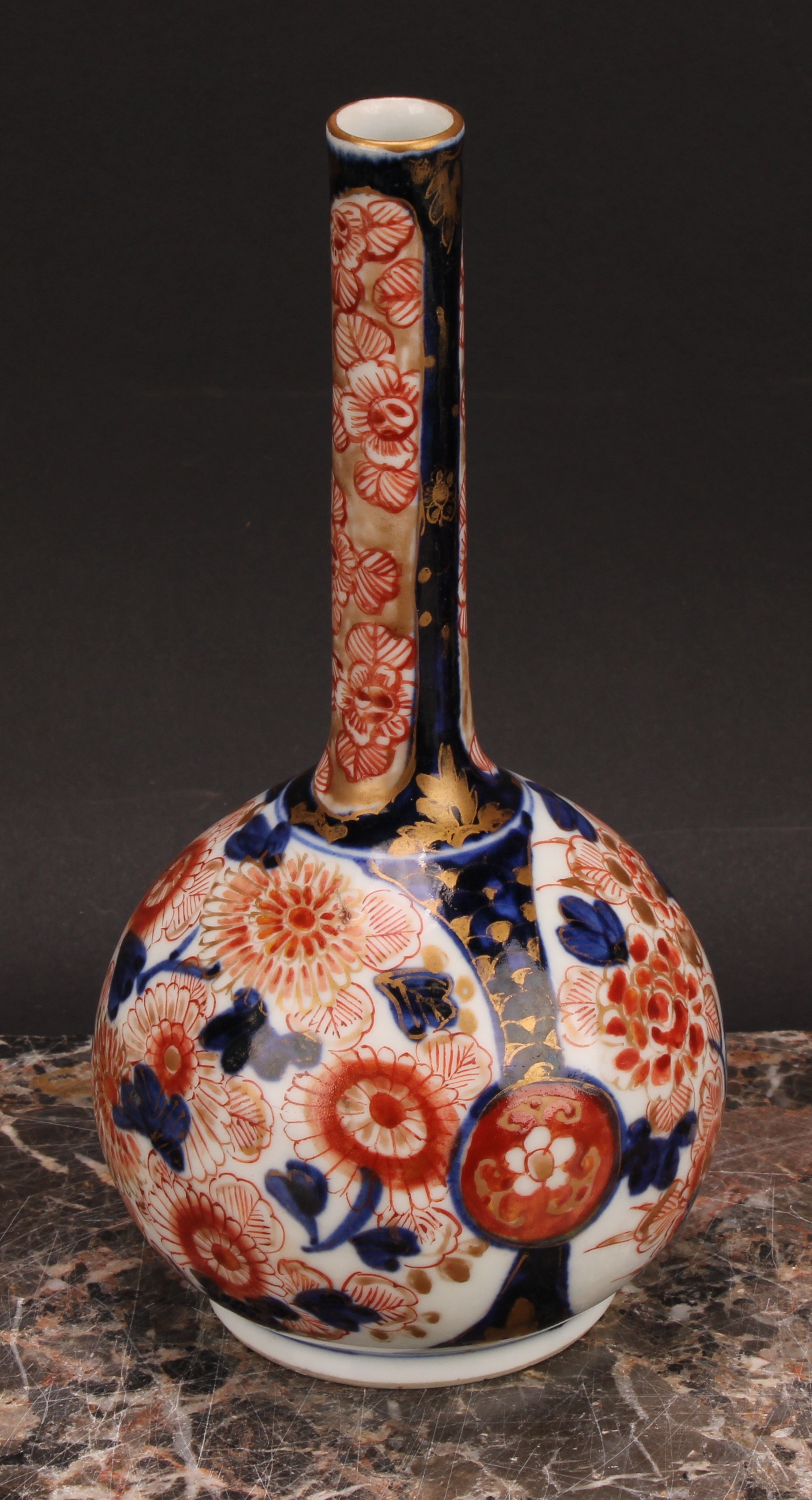 A pair of Japanese porcelain bottle vases, decorated in the Imari palette with peonies and - Image 6 of 8