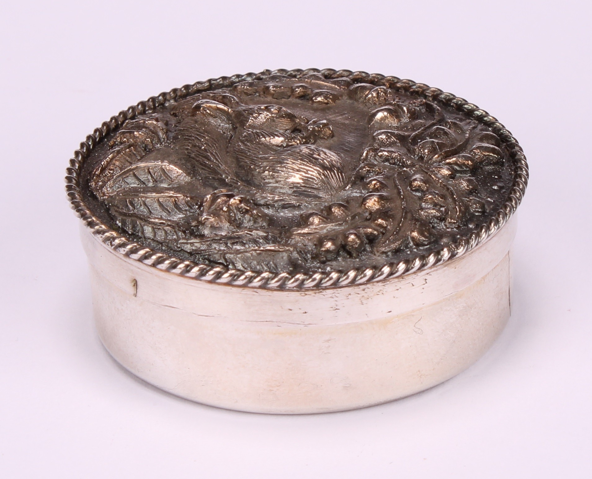 An Elizabeth II silver circular trinket box, the push-fitting cover in relief with a squirrel, - Image 2 of 5