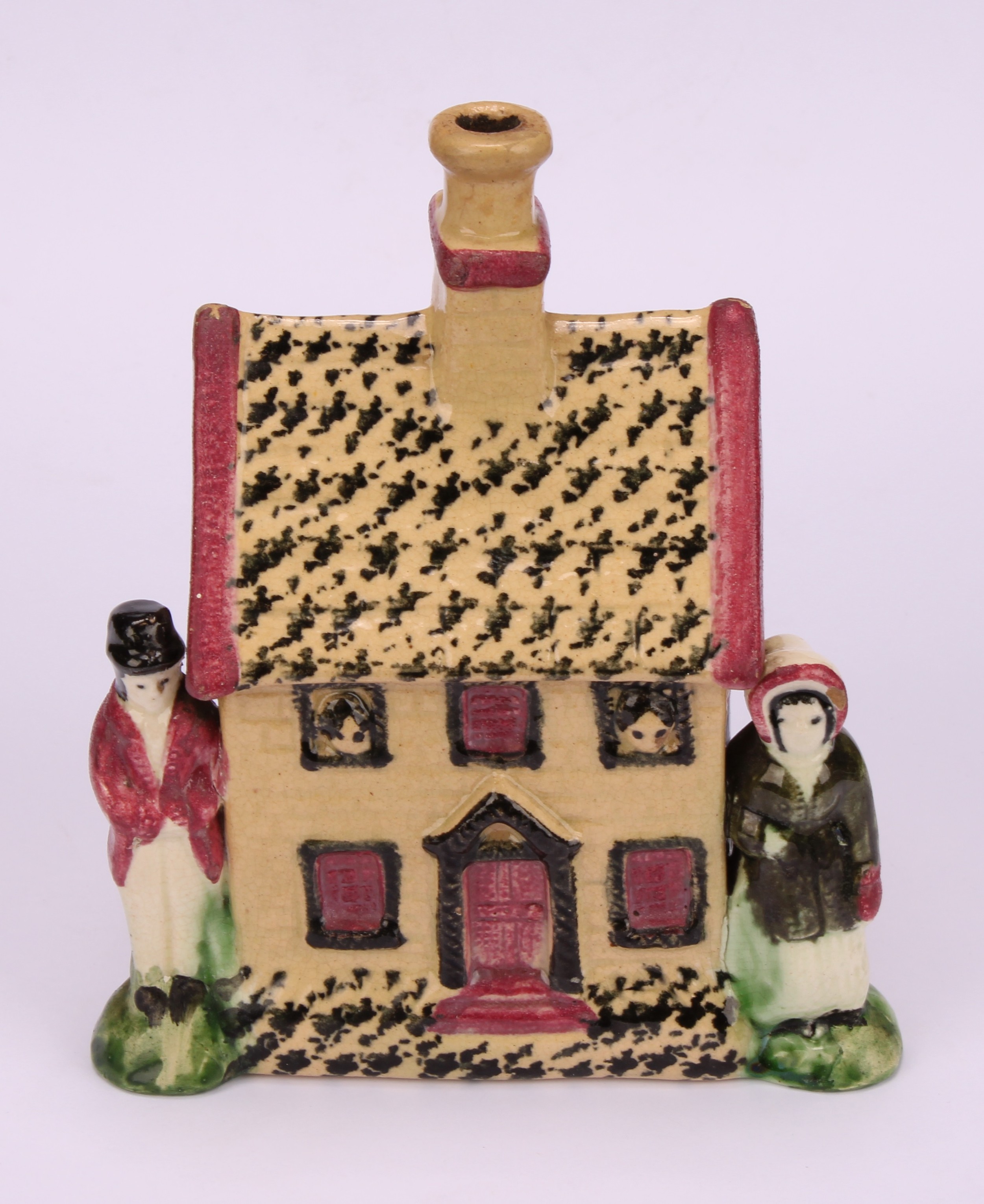 A Yorkshire Prattware polychrome spongeware cottage money box, moulded in relief with a figure to - Image 2 of 5