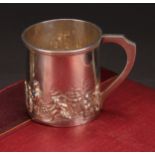 An Edwardian silver Christening mug, chased with a band of figures in the manner of Teniers, 6.5cm