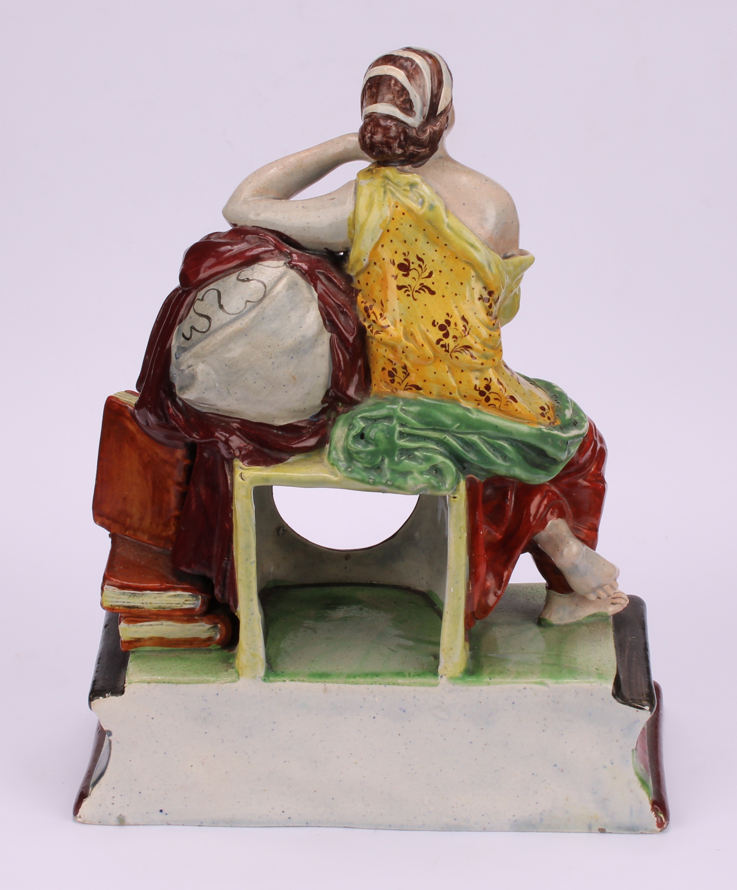 A Staffordshire pearlware pocket watch stand, modelled as Urania, The Muse of Astronomy, seated upon - Image 4 of 5