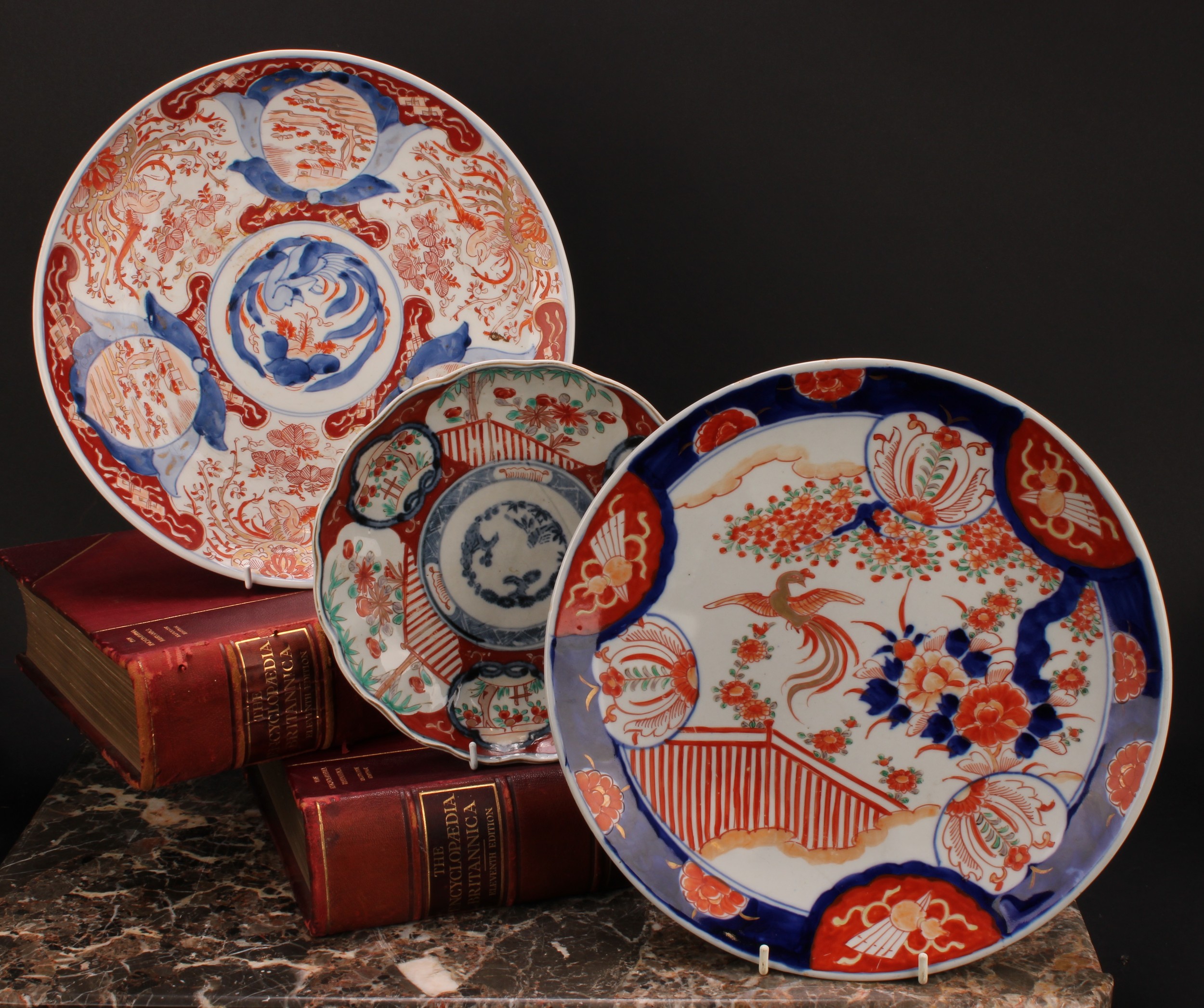 A Japanese circular dish, painted in the Imari palette, 30.5cm diam, Meiji period; others,