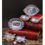 A pair of 19th century Staffordshire Willow pattern blue and white pickle dishes, 14.5cm; another