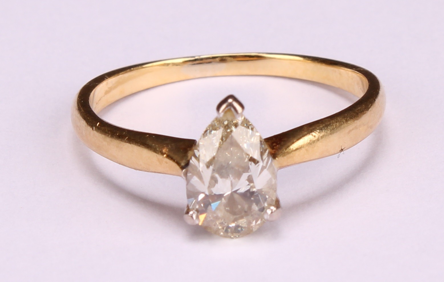 An 18ct gold diamond solitaire ring, pear cut diamond, size O/P, marked .99ct, 2.68g - Image 2 of 4