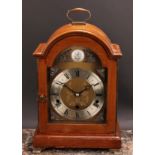 A mid 20th century mahogany bracket-form mantel clock, 17cm arched brass dial inscribed AN Elliott