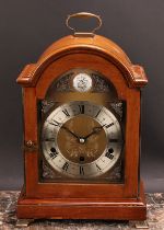 A mid 20th century mahogany bracket-form mantel clock, 17cm arched brass dial inscribed AN Elliott