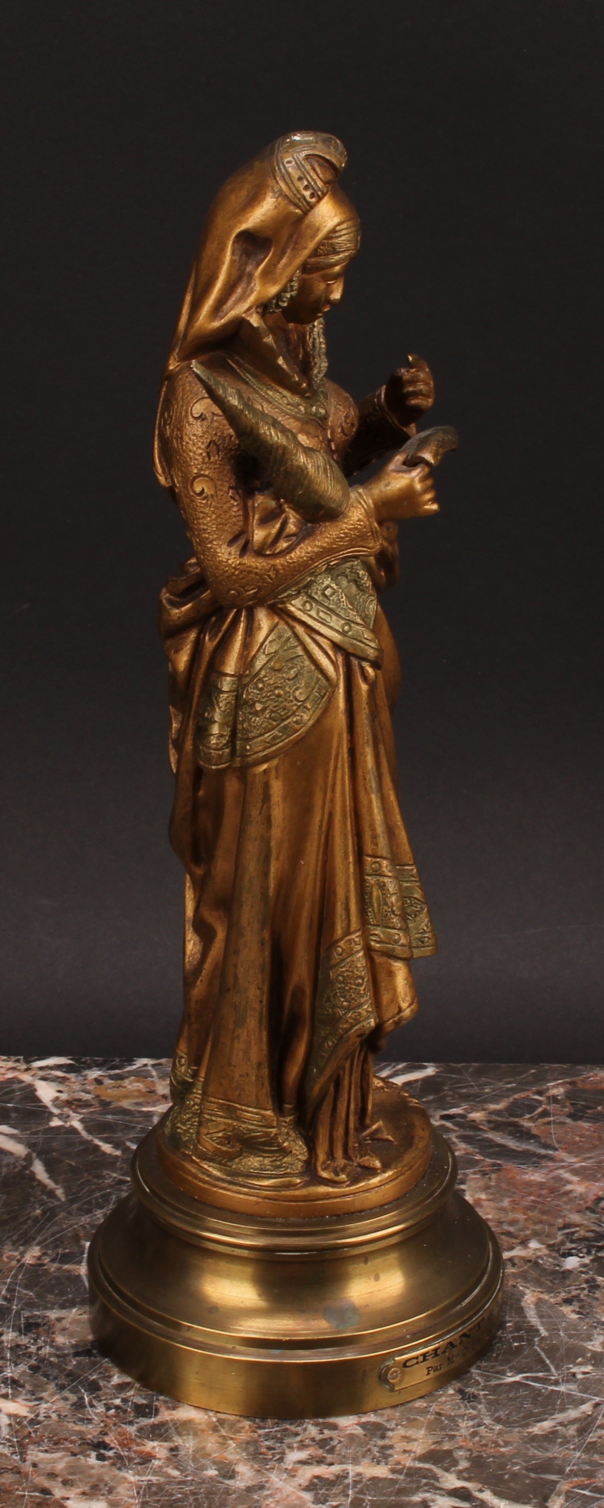 After Maurice Constant Favre (French, 1875-1919), a gilt bronze, Chant de la Fileuse, depicting a - Bild 3 aus 6