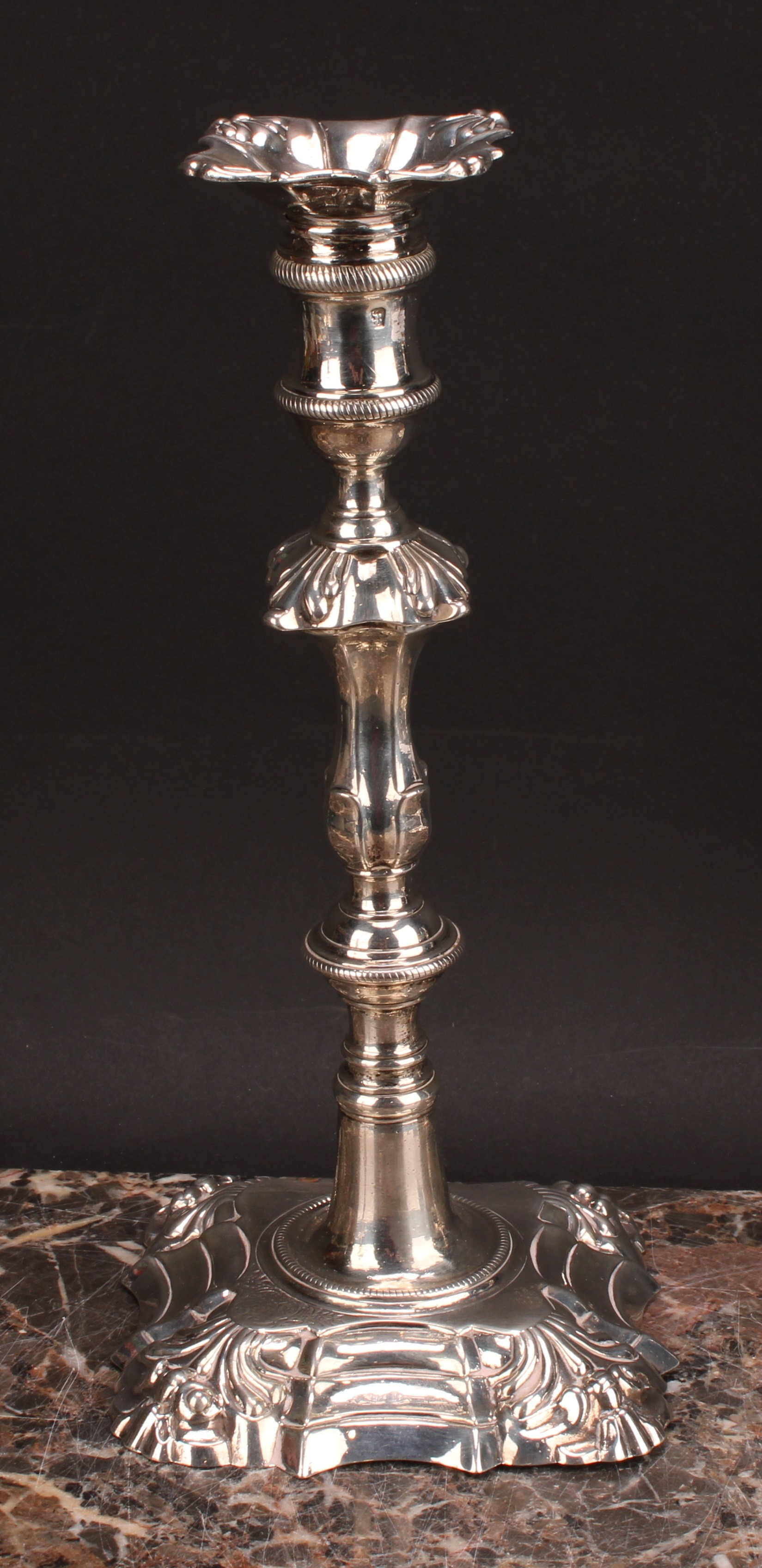 A composed set of four George II/early George III cast table candlesticks, detachable nozzles, - Image 9 of 14