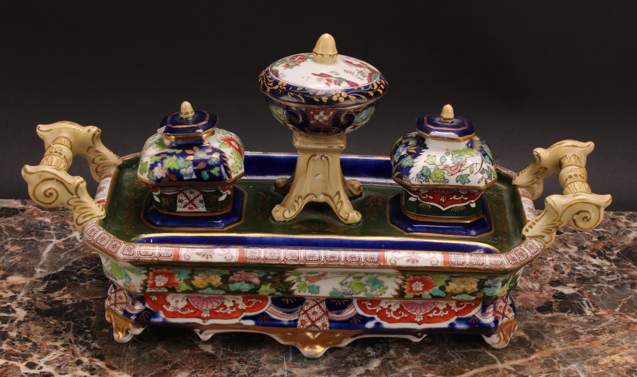 A 19th century Mason's ironstone canted rectangular ink stand, of silver shape, painted in