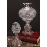 A large cut glass two piece pedestal table lamp, globular shade, 45cm high; a cut glass two piece