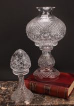 A large cut glass two piece pedestal table lamp, globular shade, 45cm high; a cut glass two piece