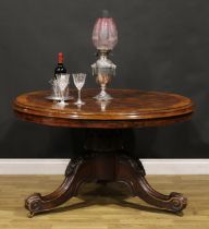 A Victorian mahogany and rosewood parquetry centre table, circular tilting top with segmented