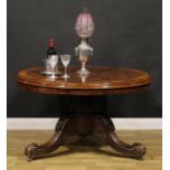 A Victorian mahogany and rosewood parquetry centre table, circular tilting top with segmented