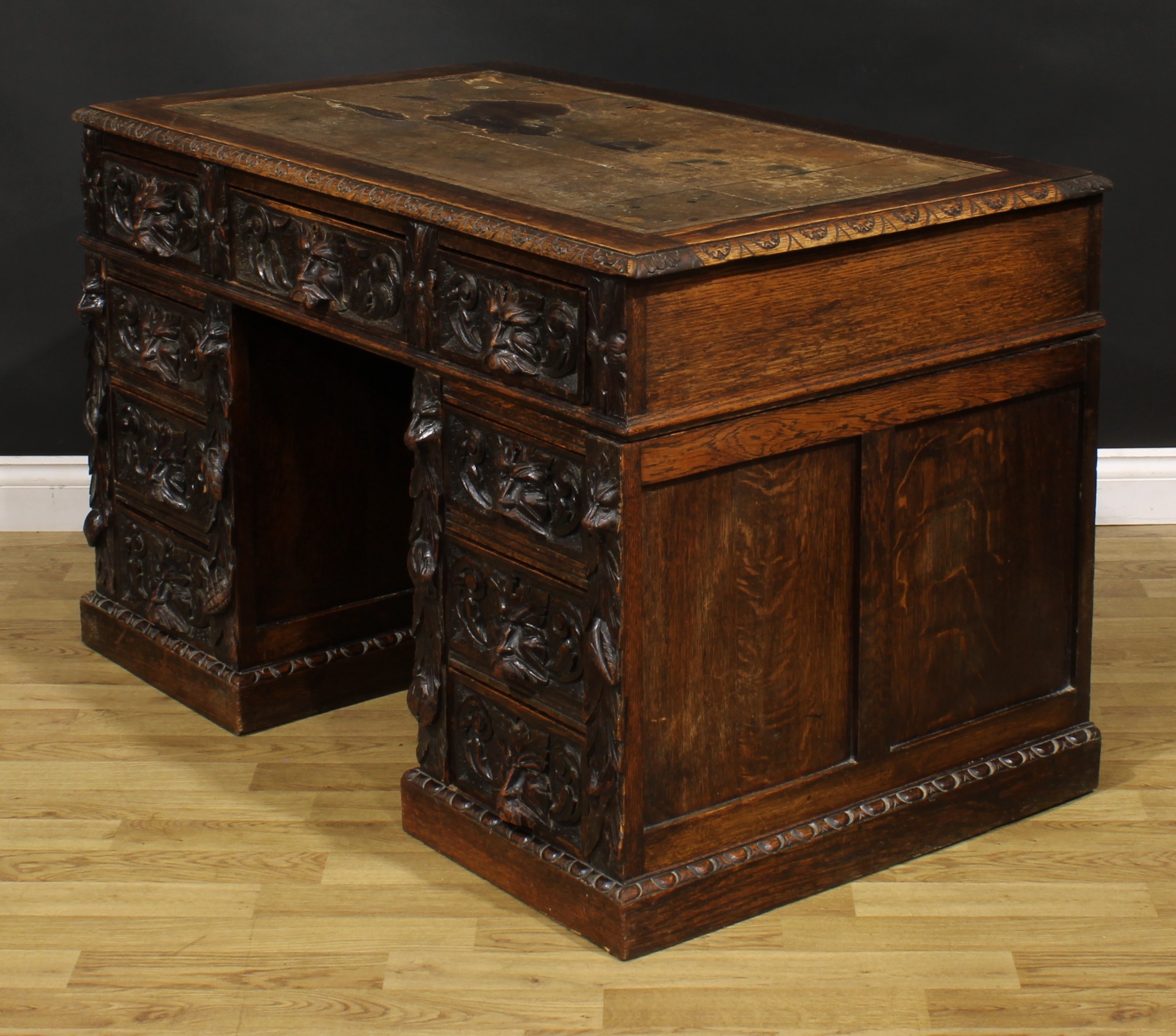 A late Victorian oak twin pedestal desk, rectangular top with foliate carved edge and inset - Image 5 of 6
