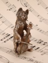 An Elizabeth II silver novelty miniature model, cast as a cat playing a cello, 6cm high