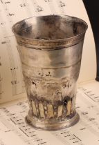 A large German silver tapered cylindrical beaker,fluted band above a skirted base, 15cm high,