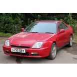 A Honda Prelude 2.0I two door saloon car in red, registration S250OBY, petrol, four speed