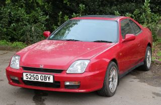 A Honda Prelude 2.0I two door saloon car in red, registration S250OBY, petrol, four speed