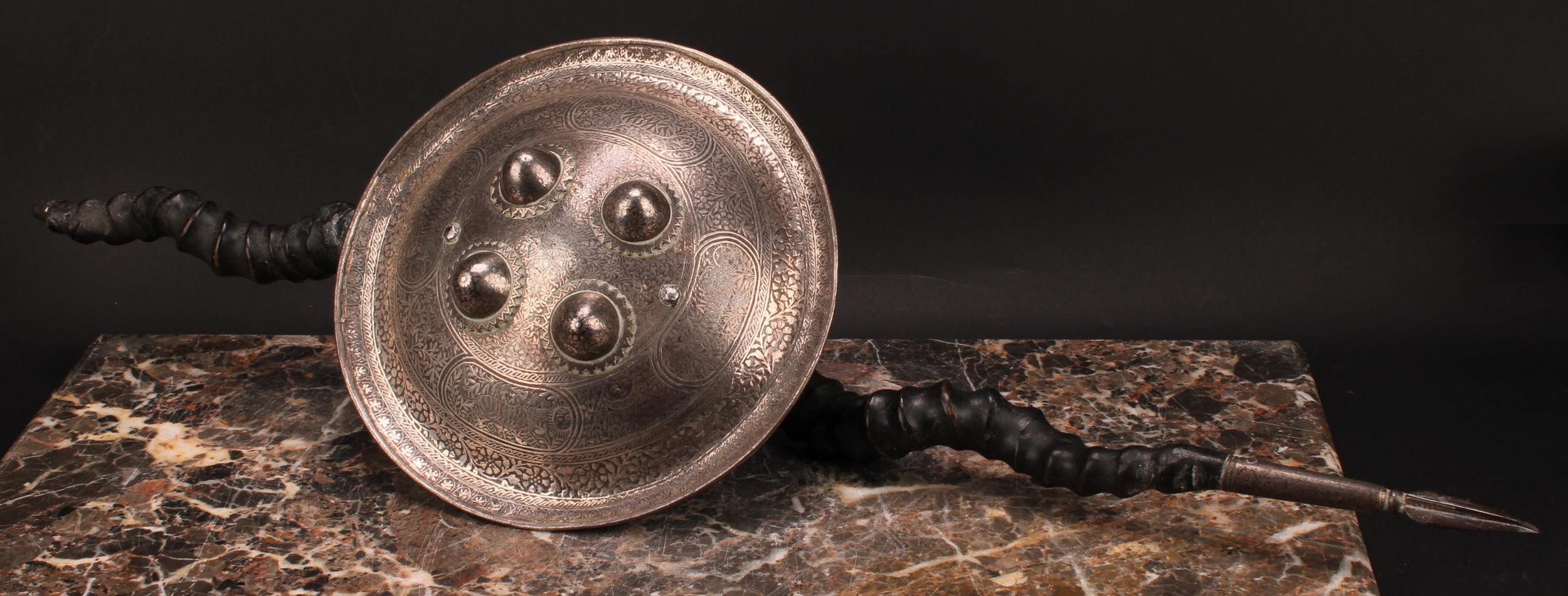 A 19th century Indian Madu parrying shield, silvered bidri shield, of traditional form, the - Image 2 of 3