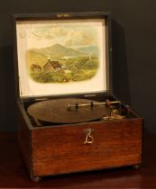 A late 19th century symphonion, horizontal mechanism playing 25cm discs, hinged cover, cranking