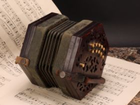A 19th century rosewood concertina, twenty one bone keys, hexagonal fretwork ends, 16cm wide,