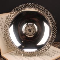 Stuart Devlin (1931 - 2018) - an Elizabeth II silver shaped circular table centrepiece dish, the