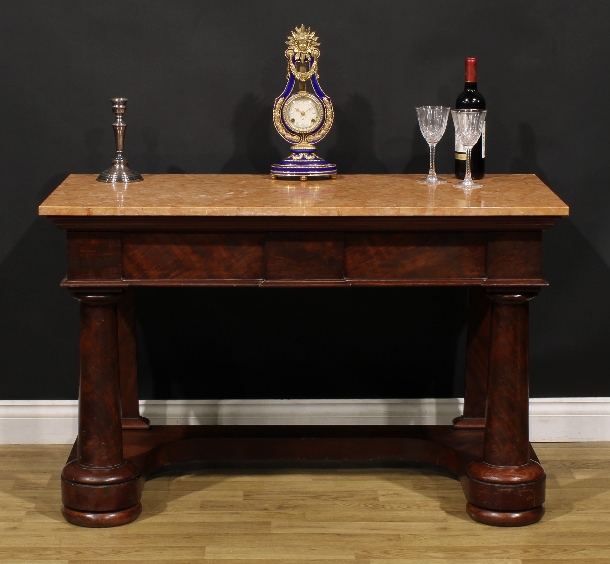 A Victorian mahogany pier table, marble top above two frieze drawers, spreading cylindrical