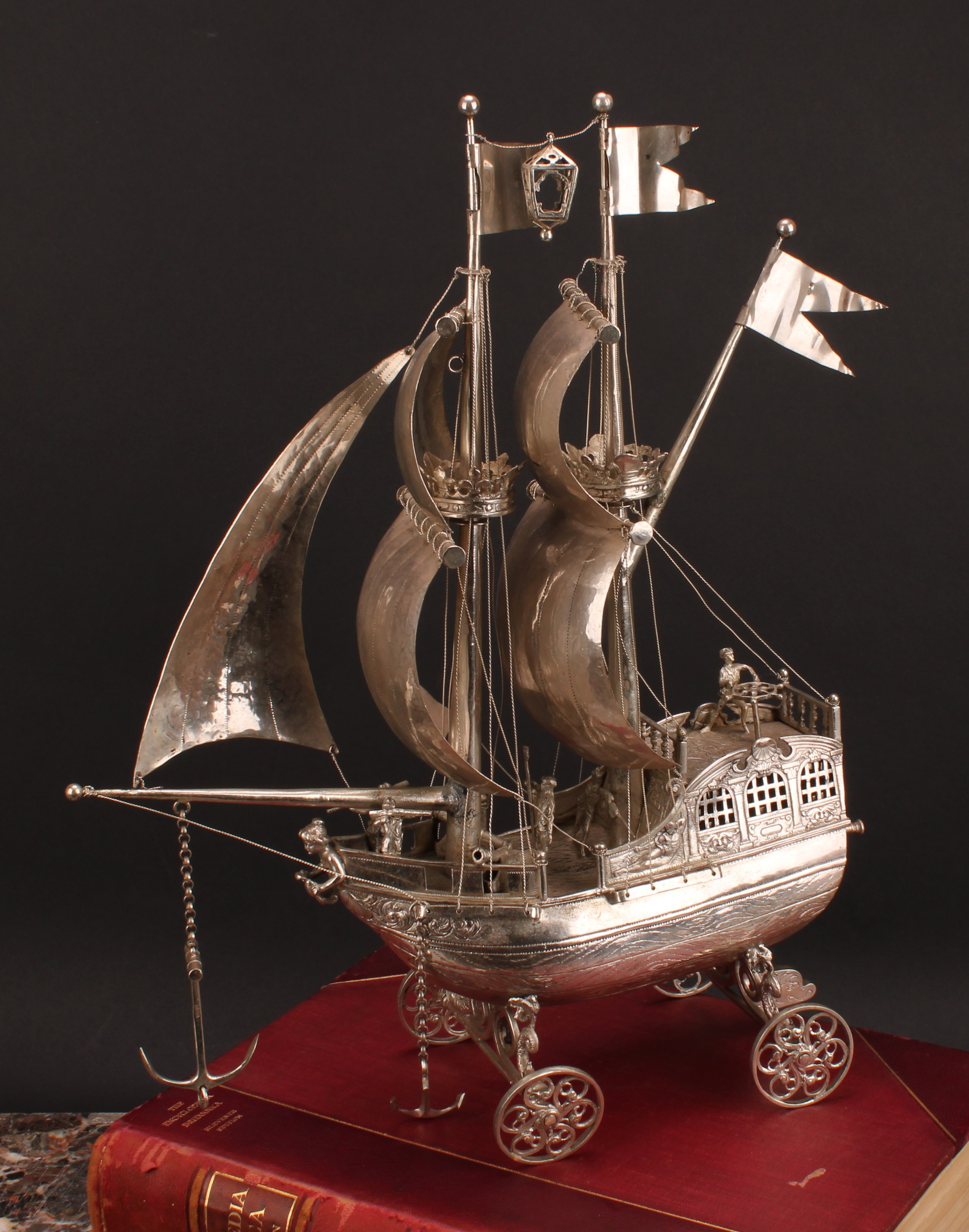 A Dutch silver nef, typically cast and wrought as a two-masted sailing ship, with billowing sails