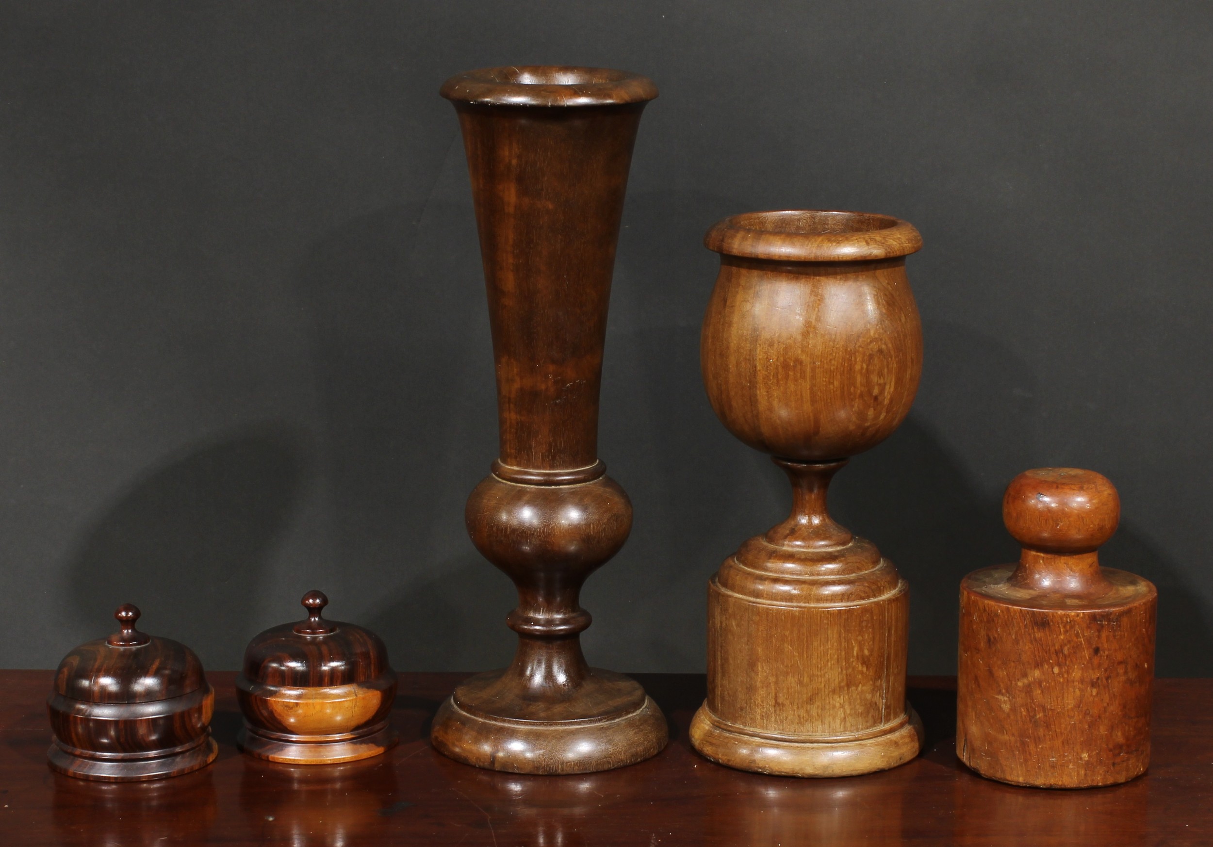 Treen - a 19th century pork pie mould, 16.5cm high; a turned wood goblet, boxes, etc (5)