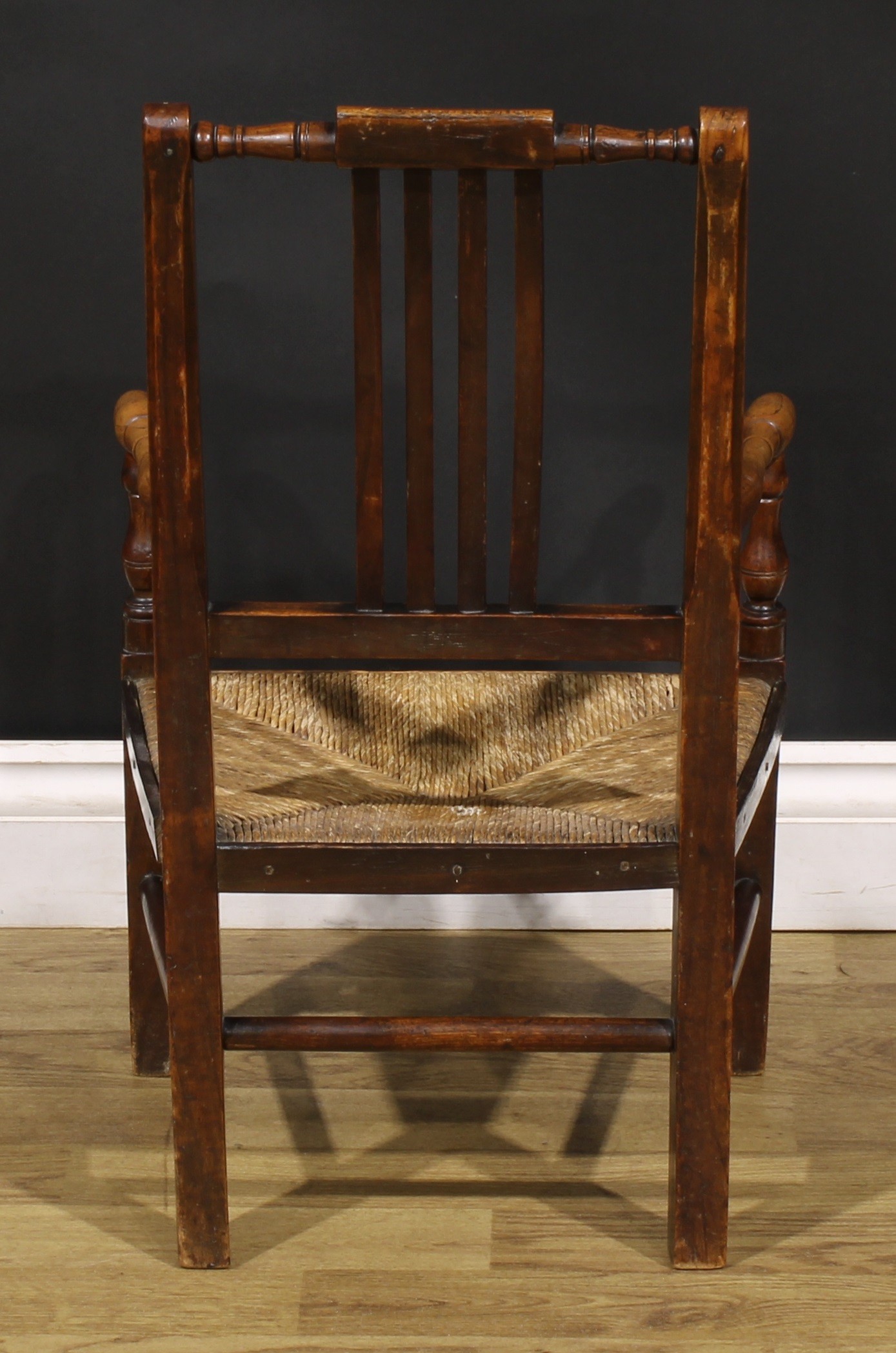 An early 19th century beech and ash child’s elbow chair, turned arms, 65cm high, 39cm wide, East - Image 4 of 4