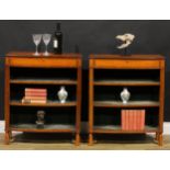 A pair of Sheraton Revival tulipwood banded satinwood library pier bookcases, each with a slightly