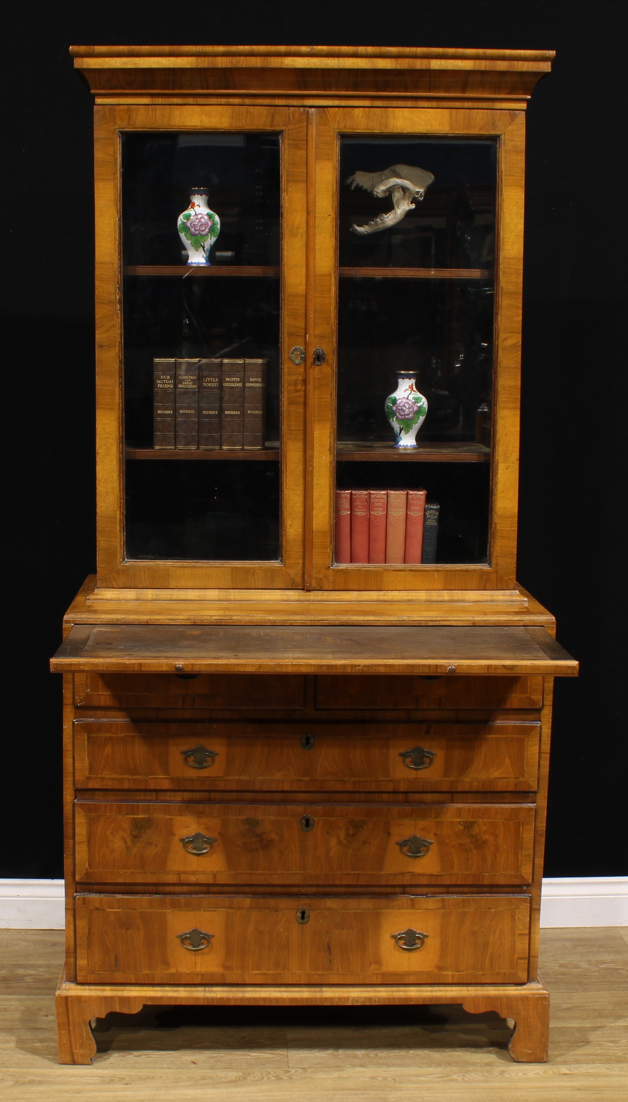 An 18th century and later walnut library bookcase, outswept cornice above a pair of glazed doors, - Image 2 of 3